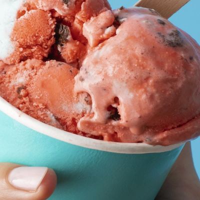Modern Painting Strawberry Ice Cream Cup Held In Hand On Light Blue Background foo39 canvas print