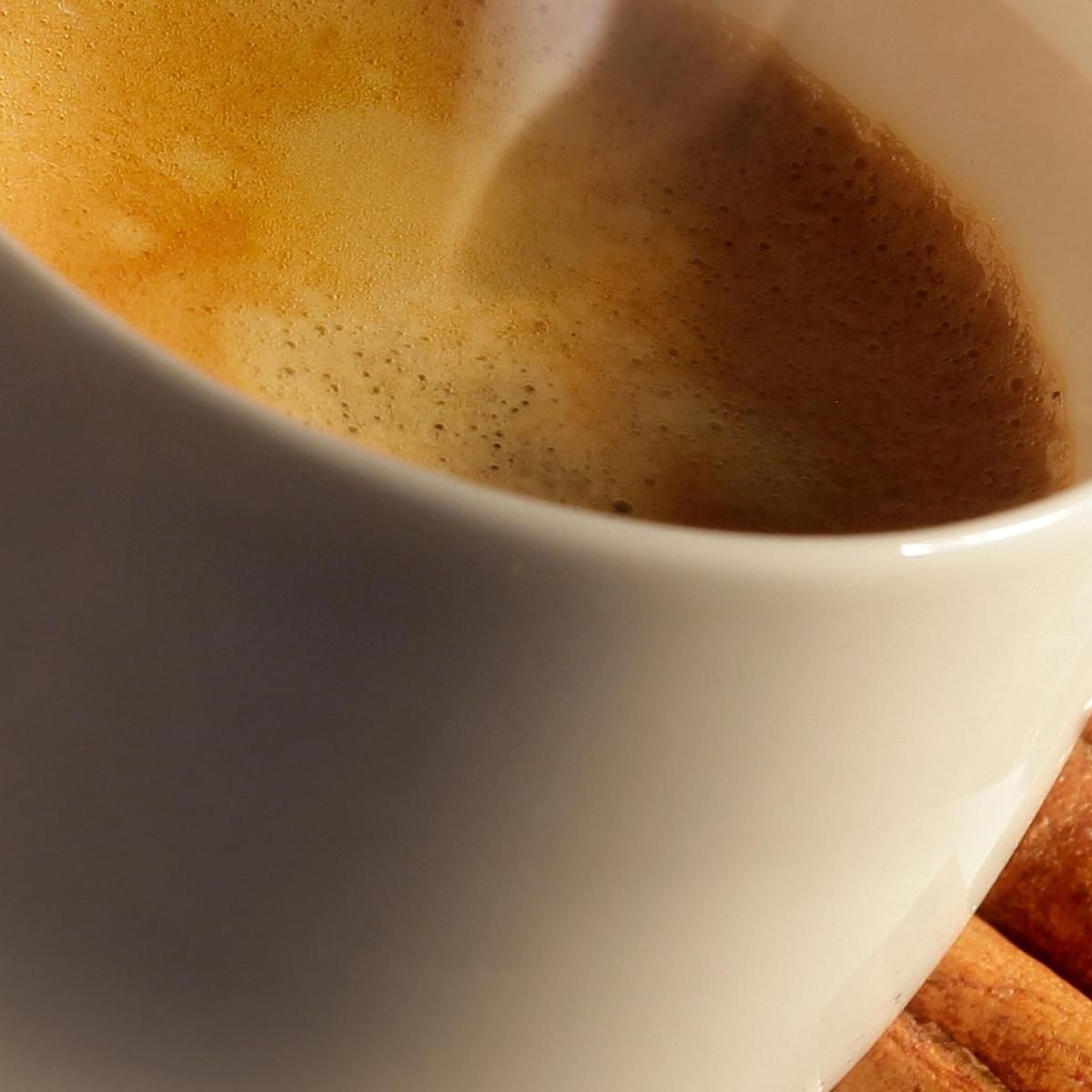 Modern Painting Steaming Cup Of Coffee With Cinnamon And Coffee Beans foo112 canvas print